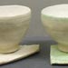 Stoneware partially glazed tea bowls with glazed tea mats